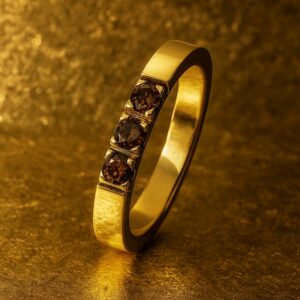 Bague “Trois Feux” en or jaune et diamants bruns
